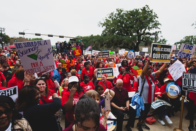 Educators, bus drivers and other public school employees rallied at the Old Florida Capitol  on Monday, Jan 13.