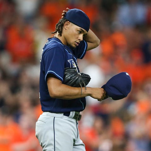 Chris Archer reacts after giving up a home run to 
