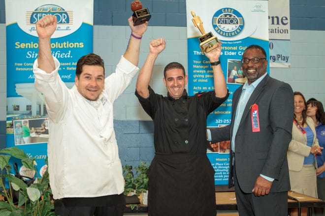 At the 2016 Best Chefs in Senior Living competition, Thomas Gurley of Palm Cottages and Manny Navarro of Market Street Residence celebrate after being presented with their trophies by former Brevard County Manager Stockton Whitten. The 2020 Chef Competition will be held during Senior Living Options Day on Jan. 31.