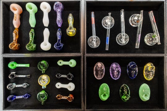 Accessories for smoking marijuana are laid out in a display case at LIV Ferndale.