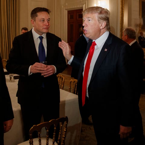 President Donald Trump talks with Tesla and SpaceX