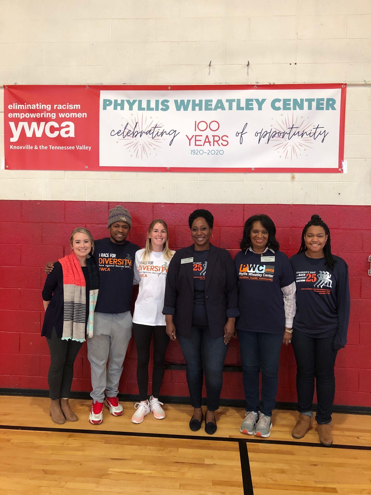 Celebrating the Phyllis Wheatley Center’s 100-year birthday all year: Karlyn Reel, YWCA director of public relations; J.D. Fuller, who oversees facilities and is also an after-school counselor; Bridget Baldau, PWC assistant director; Kathy Mack, PWC executive director; Annie Jones, ReCAB coordinator and past executive director; and Tierra Gordon, after-school counselor. Jan. 22, 2020.