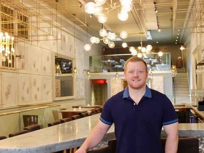 Chef Andrew Miller, shown inside his fine dining seafood restaurant Third Coast Provisions, will be opening a casual pizza restaurant named Flourchild at 722 N. Milwaukee St.