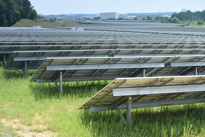 Volkswagen’s 65-acre solar farm stretches to the north from its main buildings at the automotive factory campus in Chattanooga.