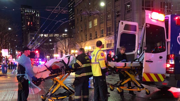SEATTLE, WA - JANUARY 22: EMT and Police give firs