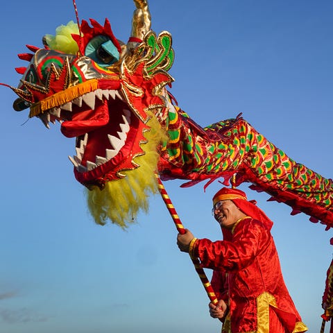 A look at the global celebration: Members of the E