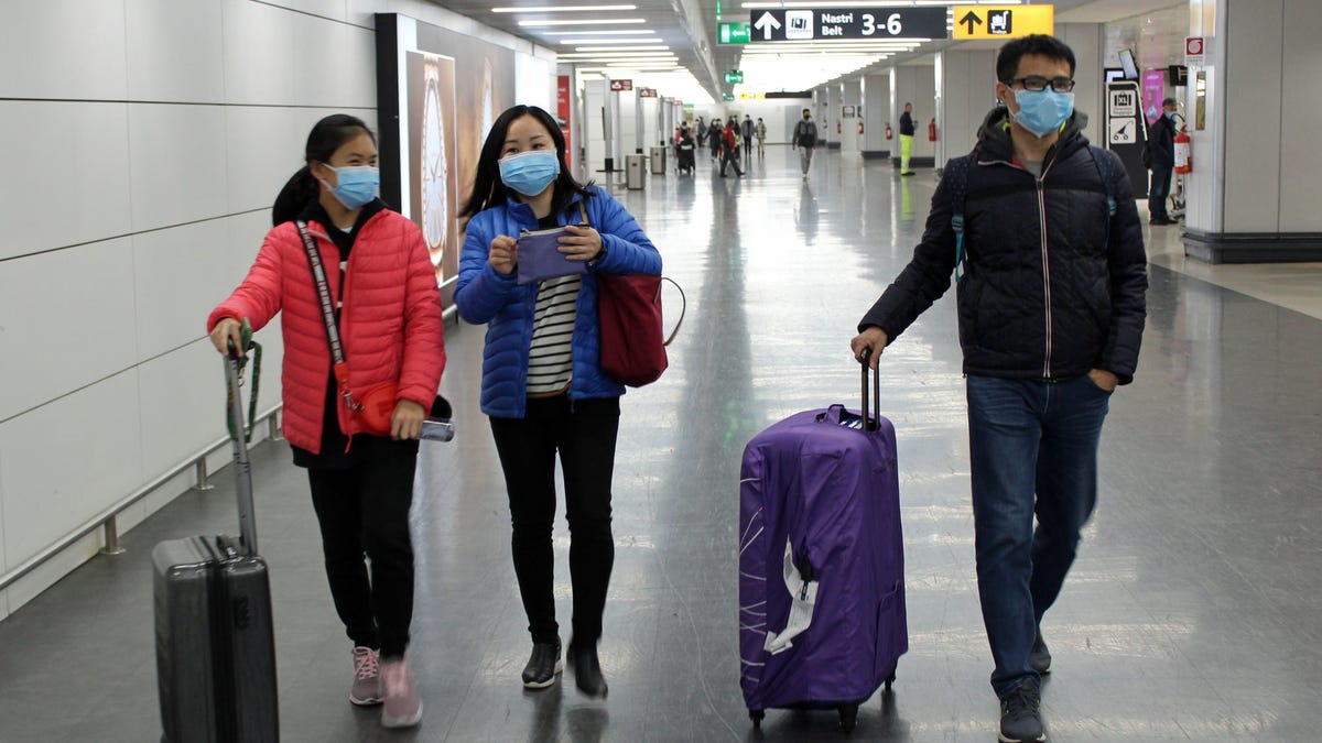Italy's health ministry says passengers arriving on direct or indirect flights from Wuhan, China, will be checked for symptoms of coronavirus. Some 202 passengers arrived Thursday.