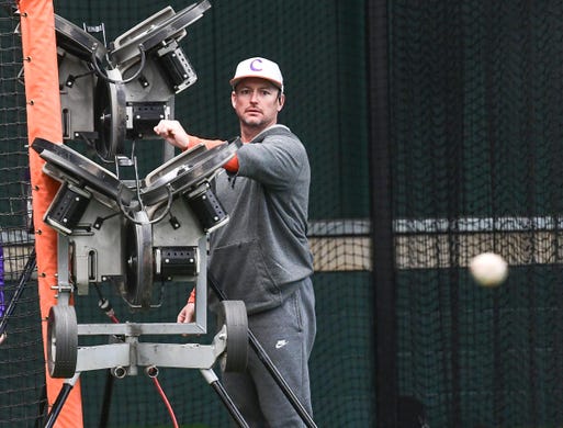 Clemson head coach Monte Lee during batting practice at the first official team Spring practice at Doug Kingsmore Stadium in Clemson Friday, January 24, 2020.