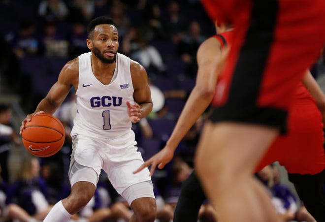 GCU's Isiah Brown (1) dribbles up the court against Seattle University during the first half at Grand Canyon University Arena in Phoenix, Ariz. on January 23, 2020. 