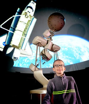 Eamon Reilly, 10, sits in the planetarium at Central York Learning Center Friday, January 24, 2020. The Sinking Springs Elementary School fourth grader is one of nine national finalists in NASA's Name the Rover contest. His rover name, Tenacity, was chosen from 28,000 entries. Bill Kalina photo