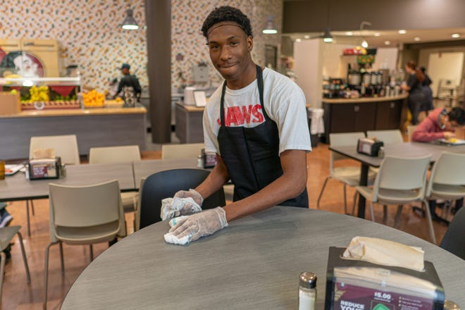 High school senior Ja'Quez Bivens earns credit hours for his work at FSU's Seminole Café.