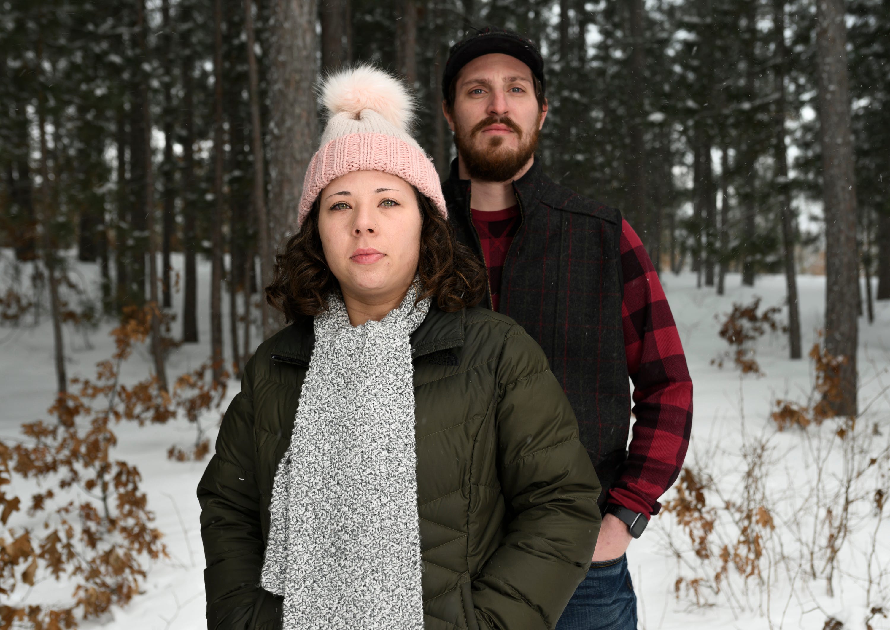 Sarah Brewster and her husband Ryan, pictured outside their home in Mining, Wisconsin, in January 2020. The Brewsters were deeply affected by their student debt, delaying both a honeymoon and having children, despite both having jobs.