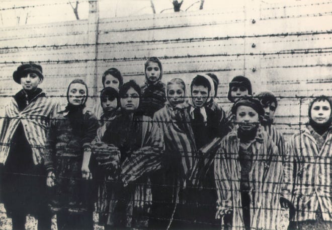 A group of children at Auschwitz just after its liberation in January 1945 by the Russian army. More than 1.5 million people died at Auschwitz during the Nazi regime.