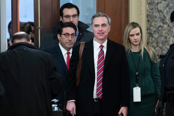 Attorneys for President Donald Trump — Jay Sekulow, left; Jordan Sekulow, back left; and White House Counsel Pat Cipollone, second from right — arrive for the Senate impeachment trial on Jan. 25.