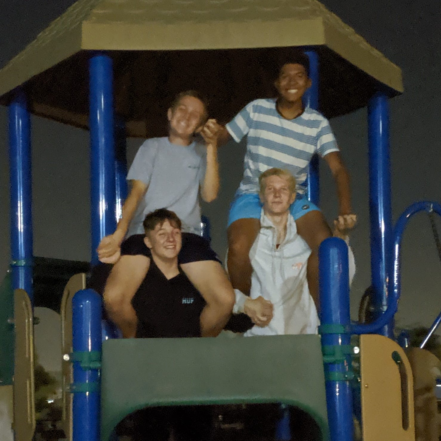 An October, 2019 photo shows Jacob Ivascu and Sergio Campusano sitting on the shoulders of Drake Ruiz and Daniel Hawkins during a youth event organized by Northpoint Evangelical Free Church of Corona