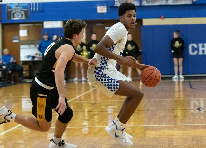 Chillicothe's Jayvon Maughmer dribbles the ball during a 55-44 loss to Upper Arlington at Chillicothe High School on Saturday, Jan. 25, 2020.