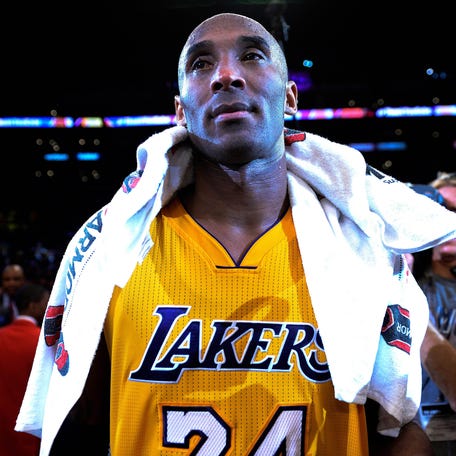 Los Angeles Lakers forward Kobe Bryant (24) looks on after the Lakers defeat of the Utah Jazz 101-96 at Staples Center in Bryant's final game of his career on Apr 13, 2016. Bryant scored 60 points in the game.