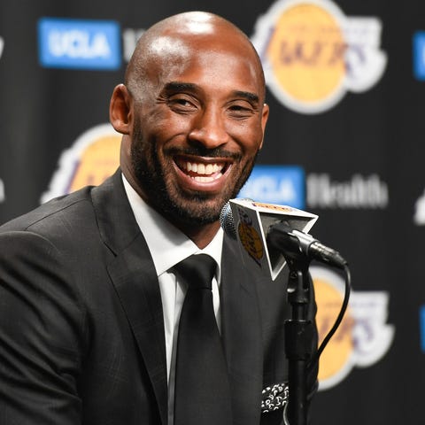 Former Lakers star Kobe Bryant speaks to the media