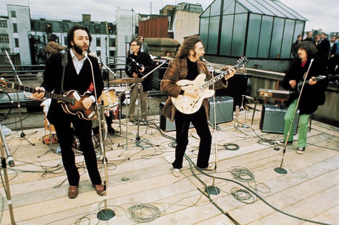 The Beatles perform on the rooftop at Apple on Jan. 30, 1969.