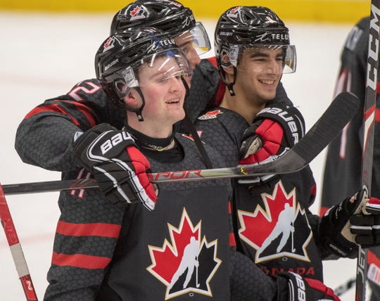 Alexis Lafreniere, left, and Red Wings prospect Joe Veleno, right, were linemates for Canada during the World Junior Hockey Championships in Ostrava, Czech Republic.