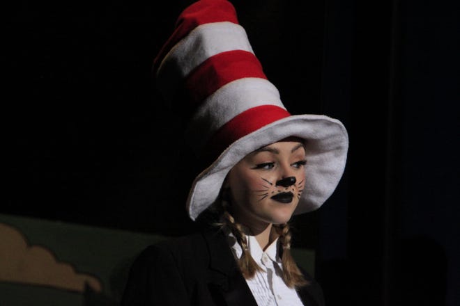 The Cat in the Hat (Alanna Bolon) leads the way through "Seussical, the Musical."