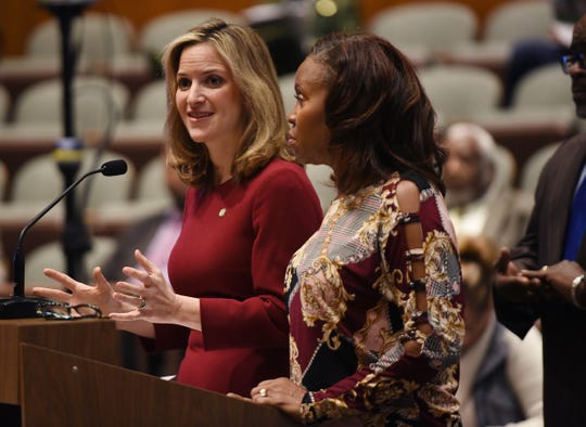 Secretary of State Jocelyn Benson, left, and Detroit City Clerk Janice Winfrey, talks about the upcoming elections and early absentee voting earlier this year.