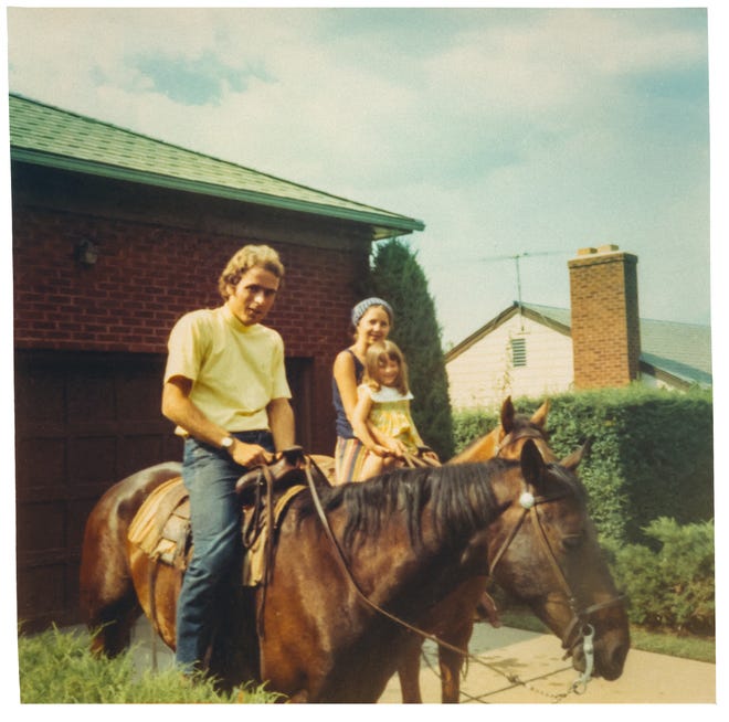 Ted Bundy with Elizabeth Kendall and her daughter Molly on horseback.