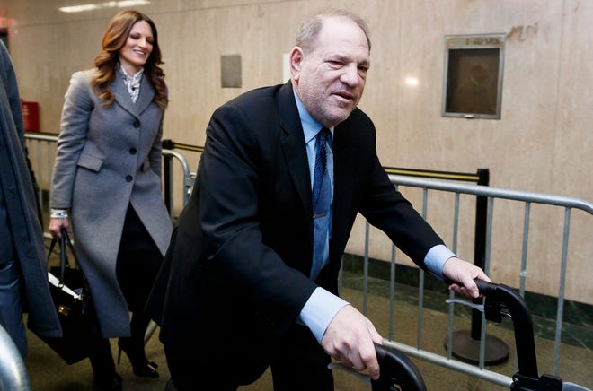 Harvey Weinstein arrives with lead defense attorney Donna Rotunno for his sex crimes trial in New York on Jan. 29, 2020.