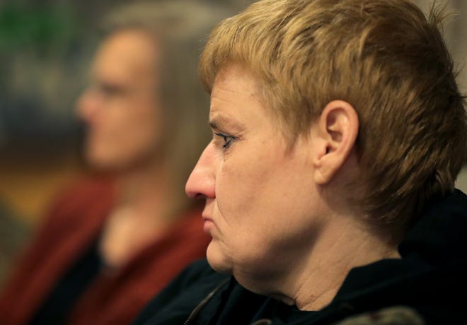 Lisa Stevenson, 48, of Kimberly, attends the volunteer-led Community Circles of Support group on Wednesday in Appleton. Stevenson has spent most of her life going in and out of prison, but has finally achieved a sense of stability after taking part in a program known as Opening Avenues to Reentry Success, which helps offenders living with mental illnesses transition to life outside prison.