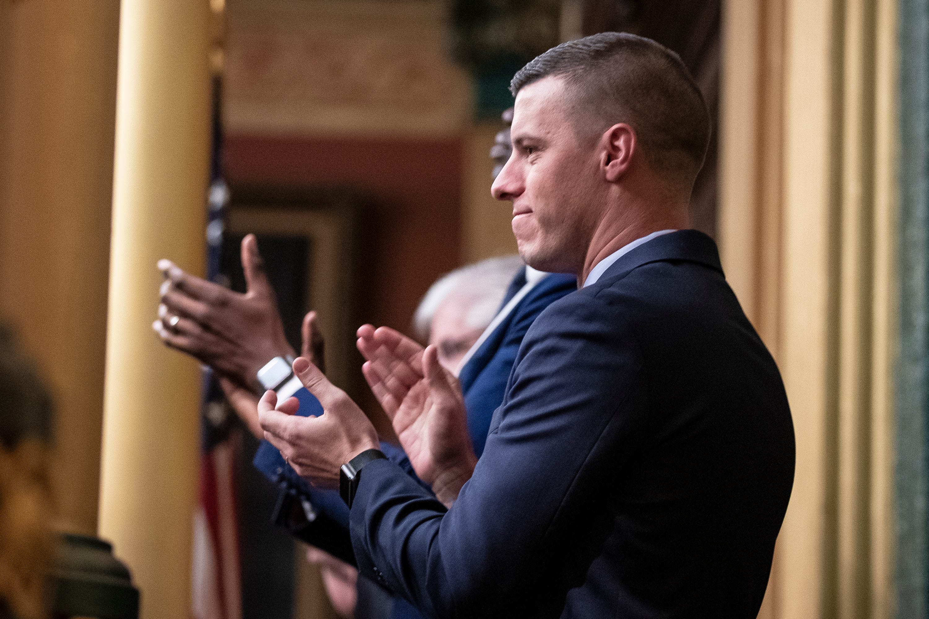 Speaker of the House Lee Chatfield applauds for Governor Gretchen Whitmer during the State of the State address at the State Capitol in Lansing, Wednesday, Jan. 29, 2020.