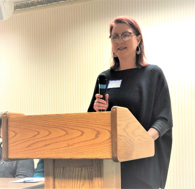 Democratic Sandusky County Candidate Holly Elder speaks at a women's issue gathering.