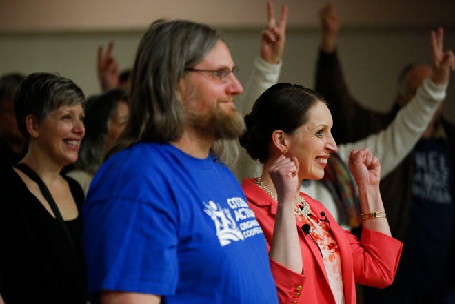 Tricia Zunker poses for a photo with attendees after answering questions Wednesday at a 7th Congressional District forum at the Labor Temple in Wausau. Zunker is running against Lawrence Dale for the Democratic nomination in a special election to fill the seat vacated by Sean Duffy in September 2019.
