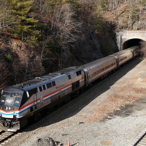  A southbound Amtrak train passes through a tunnel
