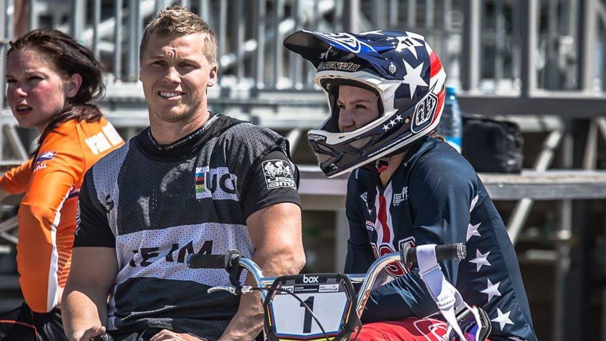 Sam Willoughby, left, and Alise Willoughby, right, team up as a coach and athlete BMX duo poised to star at the Tokyo Olympics.