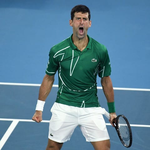 Novak Djokovic celebrates after winning a point.