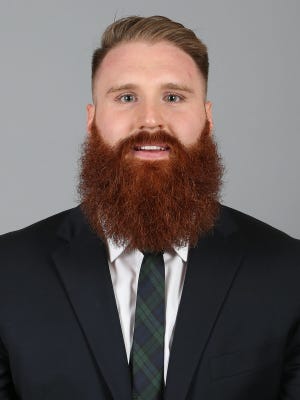Spencer Reid, the youngest child of Kansas City Chiefs' coach Andy Reid, is an assistant strength and conditioning coach at Colorado State under new football coach Steve Addazio.
