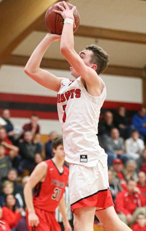 Oshkosh Lourdes Academy's Jack Huizenga shoots after getting a rebound against Hustisford High School during their game Thursday, January 30, 2020 in Oshkosh. Lourdes won the game 96-53. Doug Raflik/USA TODAY NETWORK-Wisconsin