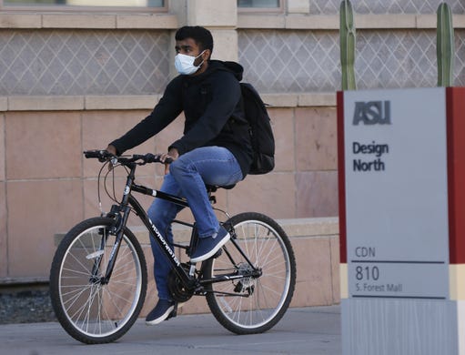 A student makes his way on Arizona State University's campus in Tempe on Jan. 30, 2020.
