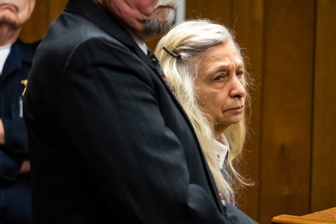Irene Burns, 77, waits at the podium during a sentencing hearing Friday, Jan. 31, 2020, in the 72nd District Court in Marine City. Burns pleaded guilty to a misdemeanor of attempted animal abandonment or cruelty for four to 10 animals at a hearing in December, and was sentenced to 30 days in jail and two years' probation.