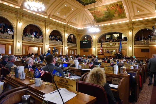 Legislators fill the House Chamber on Tuesday, Jan. 14, at the State Capitol in Pierre.