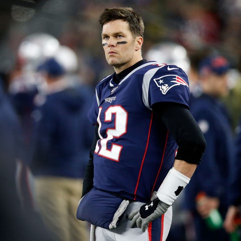New England Patriots quarterback Tom Brady (12) wa