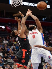 Raptors' Kyle Lowry knocks the ball from Pistons' Andre Drummond for a turnover in the second quarter.