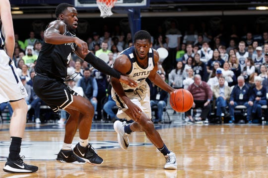 INDIANAPOLIS, IN - FEBRUARY 01: Kamar Baldwin #3 of the Butler Bulldogs handles the ball against Maliek White #4 of the Providence Friars in the first half of the game at Hinkle Fieldhouse on February 1, 2020 in Indianapolis, Indiana. (Photo by Joe Robbins/Getty Images)