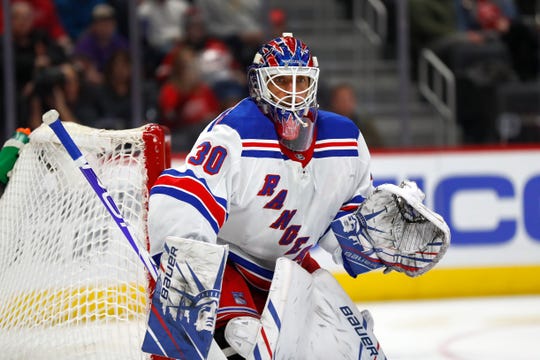 New York Rangers goaltender Henrik Lundqvist plays against the Red Wings in the second period.