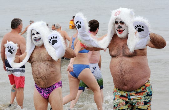 As part of the 29th annual Lewes Polar Bear Plunge, several thousand people...