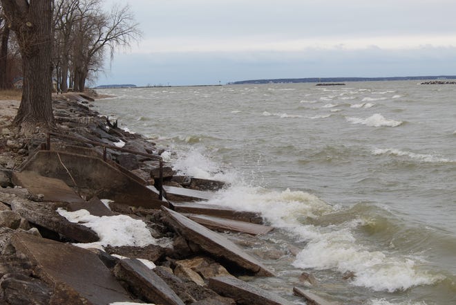 Brisk winds pushed Lake Erie's high water levels up against shoreline barriers at East Harbor State Park Tuesday. The Ohio Department of Natural Resources expects the high water levels to possibly lead to flooding and shoreline erosion at some of Ottawa County's state parks in 2020.