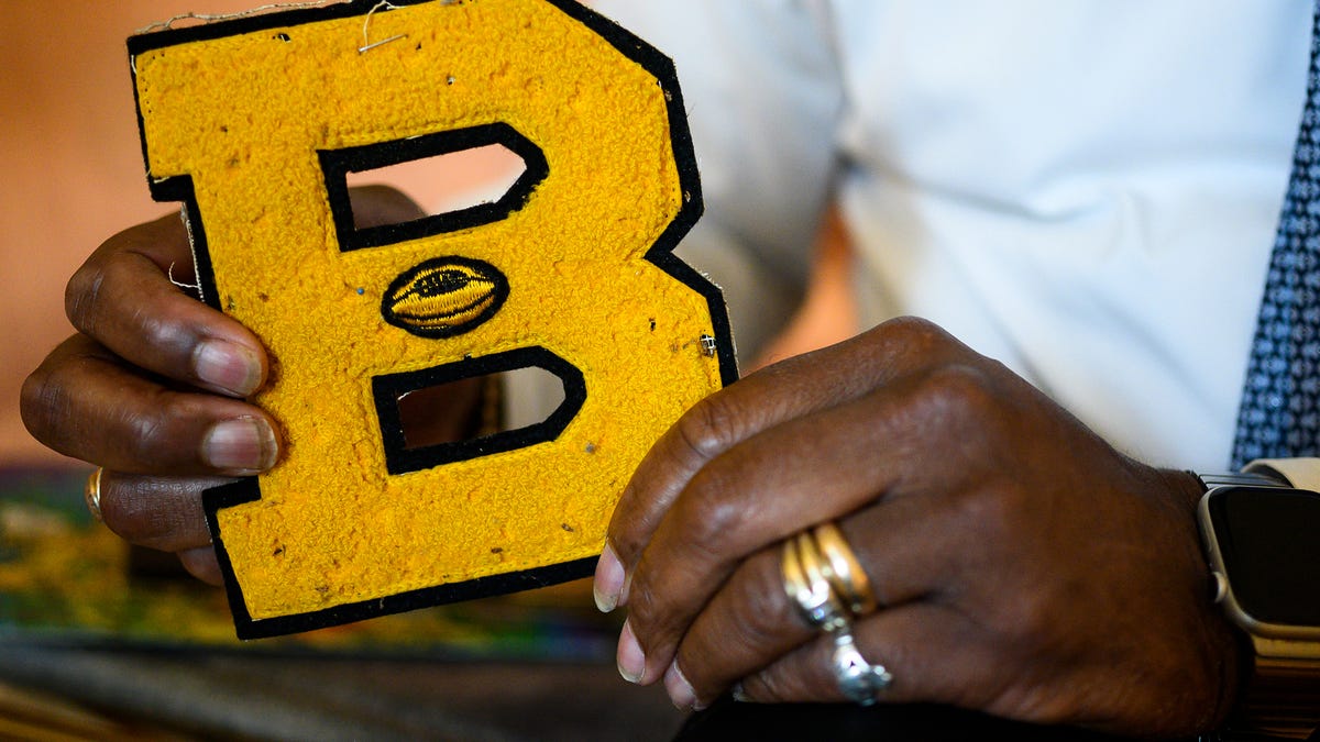Ernest Hamilton holds his Beck High School varsity letter. Hamilton was part of the last graduating class at Beck before Greenville County Schools integrated in 1970.