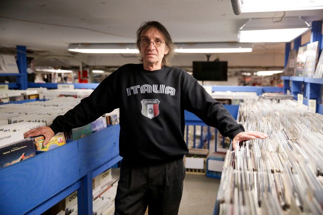 Jim Pasdach, owner of JL Records, stands for a portrait inside his store, Tuesday, Feb. 4, 2020 in West Lafayette.