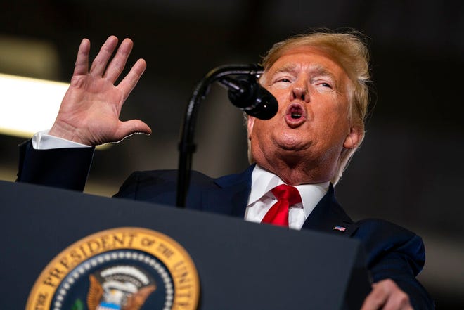FILE - In this Jan. 28, 2020 file photo, President Donald Trump speaks during a campaign rally at the Wildwoods Convention Center Oceanfront, Tin Wildwood, N.J. (AP Photo/ Evan Vucci)