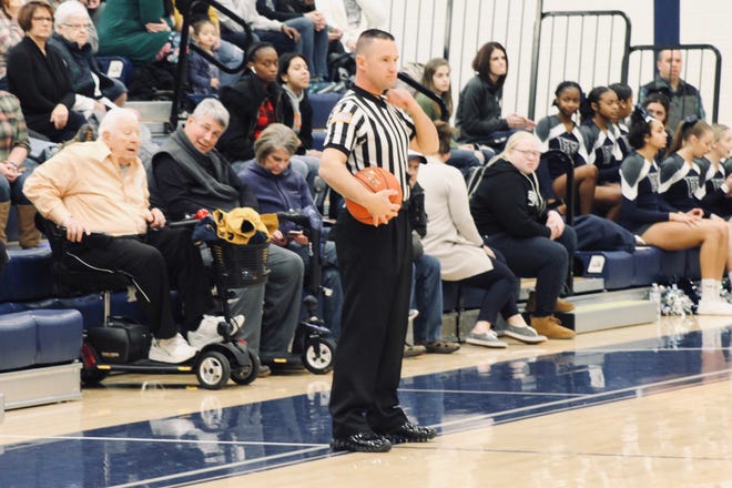York County basketball official Kevin Lawrence waits as the players prepare for the start of a game. Lawrence wore a microphone for the York Dispatch to help show why youth officials are in decline.